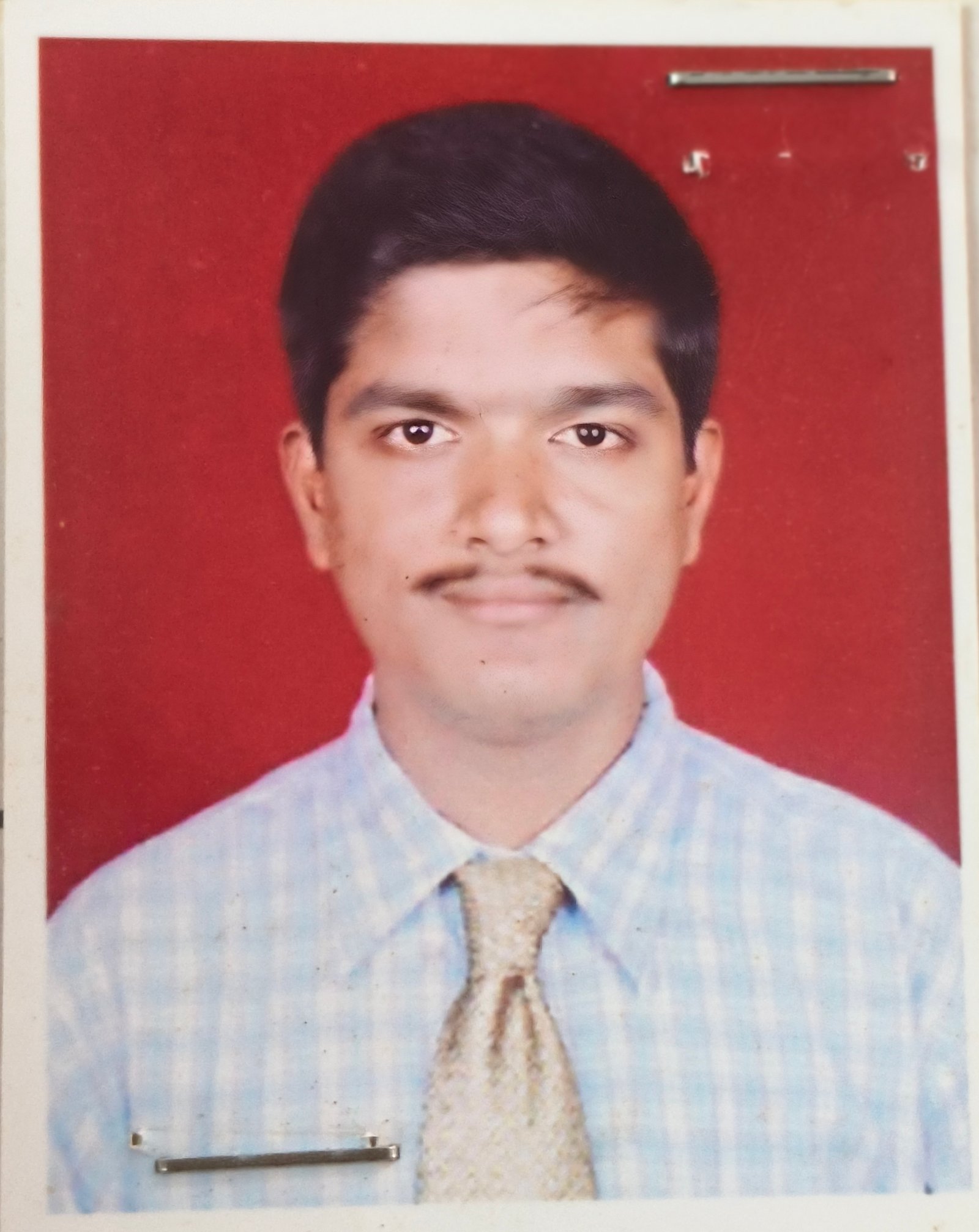 Dr. ISWARI PRASAD PADHI